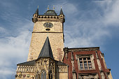 Orloj Tower in Old Town square. City Hall in Prague