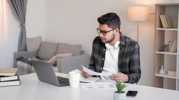 istock Business strategy man laptop documentation office 2113346238