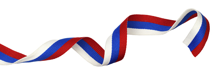 Twisted rep ribbon in colors of Russian flag isolated on white