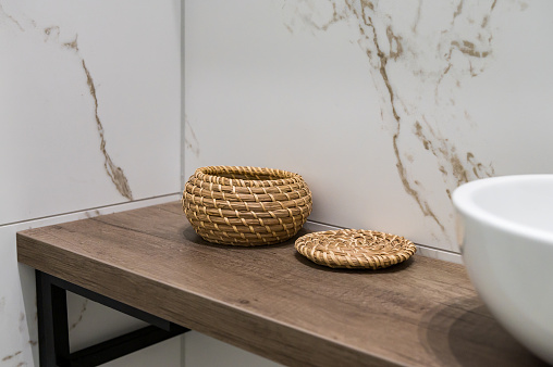 Woven Baskets on Modern Bathroom Shelf