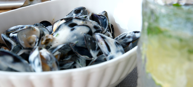 the shells of mussels Oyster served with sauce and french fries. High quality photo