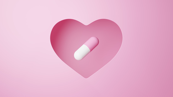 3D Illustration.Capsule on pink background cut out in heart shape. Pill. (horizontal)