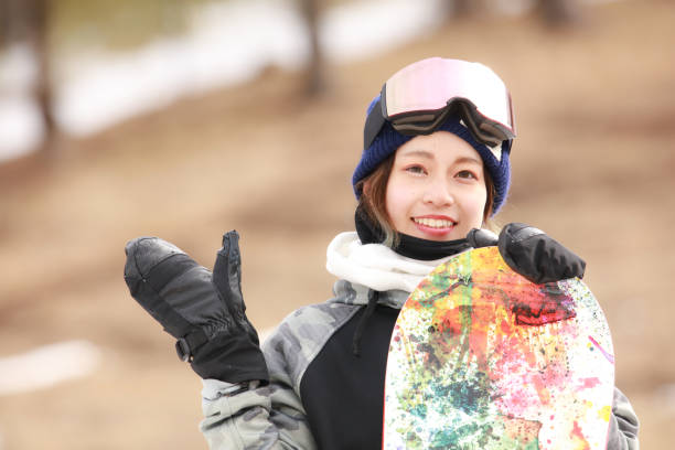 istock snowboarding wear women 2113713619
