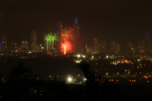 Fireworks being launched into the sky over Surfers Paradise.
