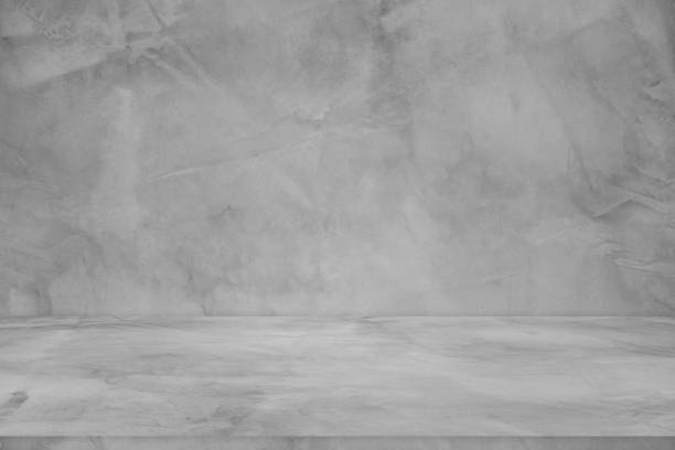 istock Wall background and backdrop of concrete cement wall in black and gray tones. Studio interior background and empty space Decorating ideas 2113775492