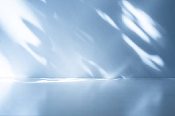 Wall interior background, studio, and backdrops show products. with shadow from window color white and blue light. background for text insertion and presentation of product