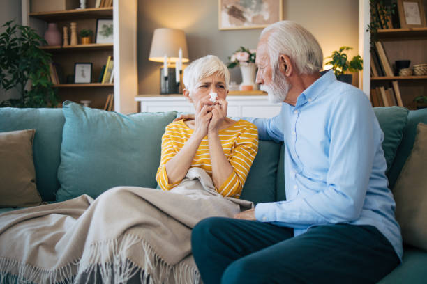 istock Husband taking care about his sick wife. 2113801558