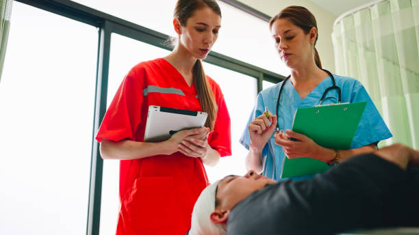 istock Physicians attending to ER patient. 2113823583