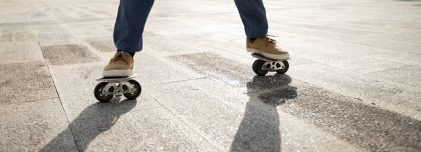 istock Freeline skateboarder legs skateboarding at city 2113832343