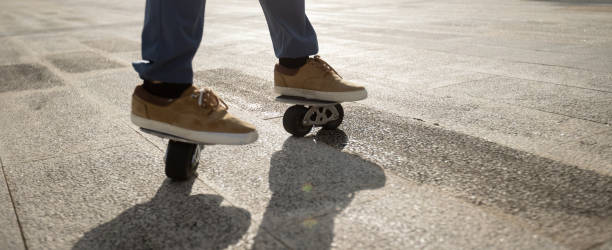 istock Freeline skateboarder legs skateboarding at city 2113832873