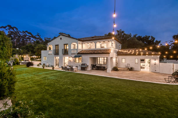 istock the exterior view of the home at night with string lights 2113855432