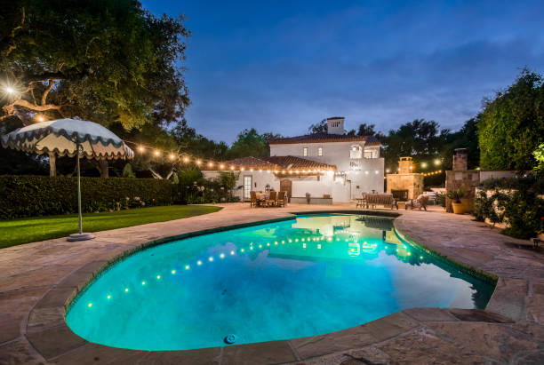 istock this beautiful pool is lit up for the evening, so you can still see what 2113856107