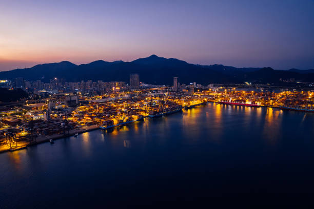 istock Aerial view of container terminal at night 2113860601