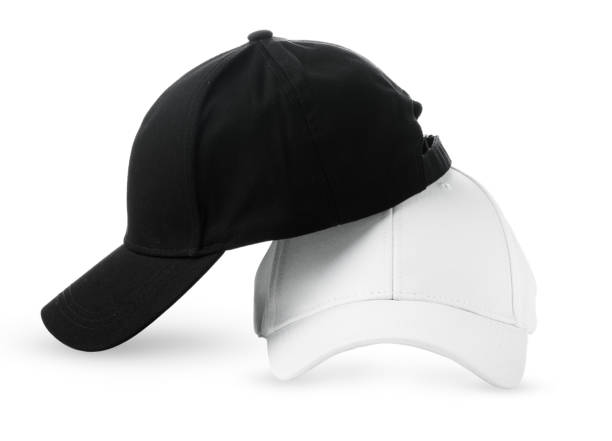 istock Black and White Baseball Caps Positioned Side by Side on a Clean White Background 2113888220