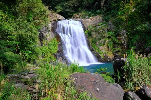 Water falls in the Neidong Forest Recreation Area situated at the upstream of Nanshih Creek, Wulai District, New Taipei City, Taiwan