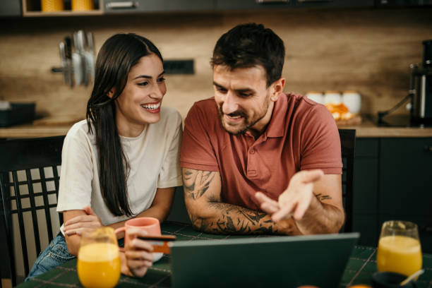 istock Browsing online for packages on a laptop 2113923867