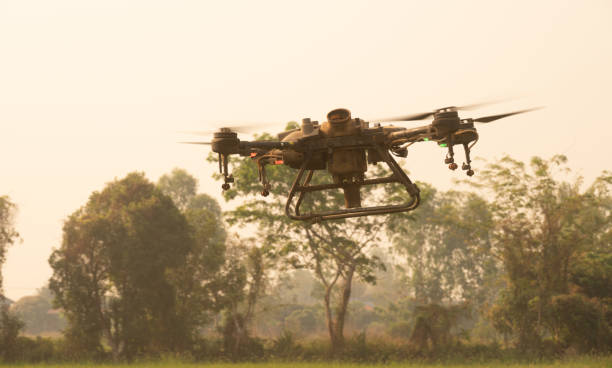 istock An agricultural drone while use to soil and field analysis. 2113937941