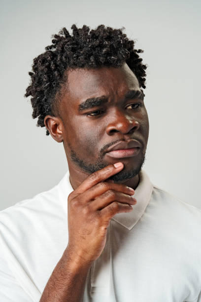 istock Man Contemplating With Hand on Chin 2113943484