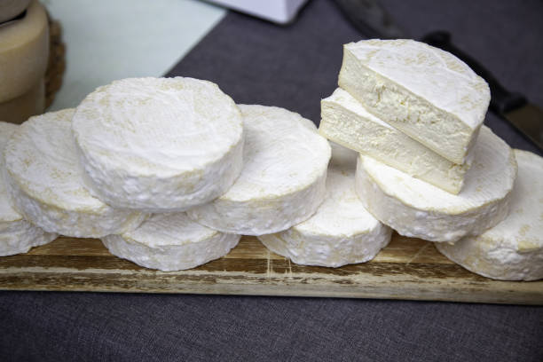 istock Pieces of cheese in a market 2113966419