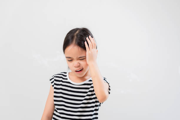 istock Cute child girl tired having headache, 2114004028