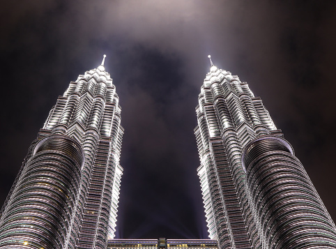 Kuala Lumpur Malaysia - March,15 2024 : Cityscape of Petronas Twin Towers or KLCC Twin Towers, Night view of the Petronas Twin Towers at KLCC City Center. The most popular tourist destination