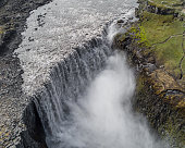 Scenic Dettifoss flowing down the side of a cliff in Iceland