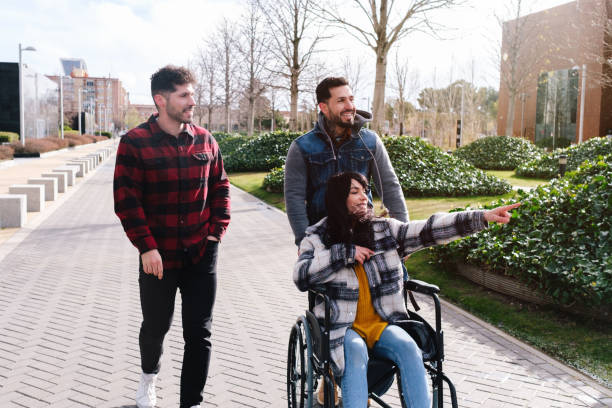 istock Friends Enjoying a Day Out in a City Park 2114123786
