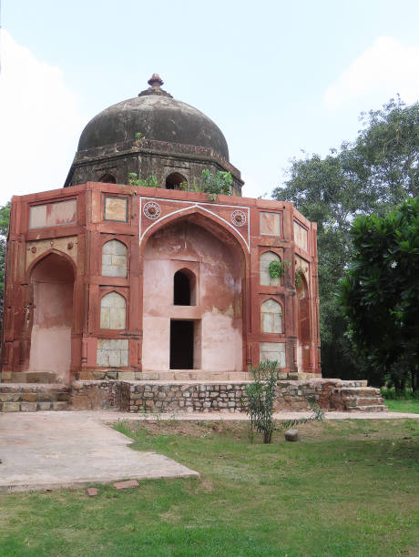 istock India, Delhi, ancient mausoleum in a tropical park 2114162352