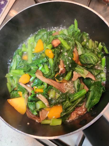 istock Stirred Fried Vegetables in cooking pan 2114187268