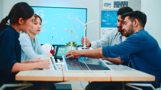 istock New business group teamwork and discuss robot arm in the office. 2114187804