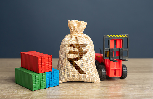 Forklift with shipping containers and indian rupee money bag. GDP and production. Import or export. Trade, economics and transport industry. Tariffs and tax collections. Production of containers.