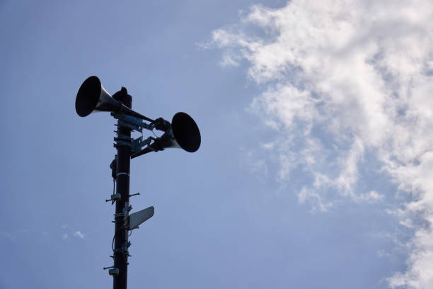 istock Tsunami warning speaker standing on the coast 2114204892