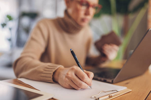 istock Woman working in home office 2114249704