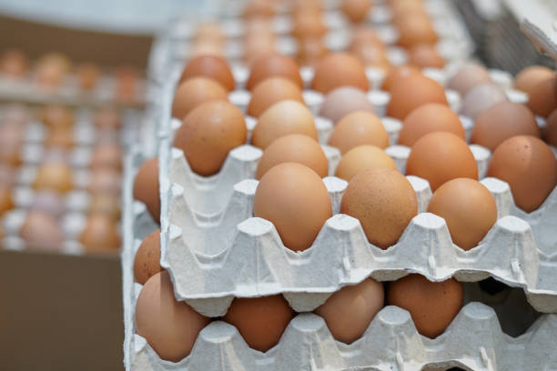 istock Pallet with brown eggs in the grocery store 2114317378