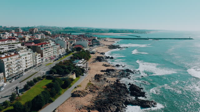 Drone view of beautiful Porto coast near the Douro river mouth in a sunny
