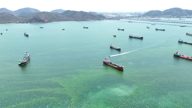 many Oil Crude Gas Tanker Ship, Cargo container Ship offshore mooring at Ocean Bay Petroleum Chemical export import transportation and logistics, Oil leak from Ship, industrial petroleum products Vessel