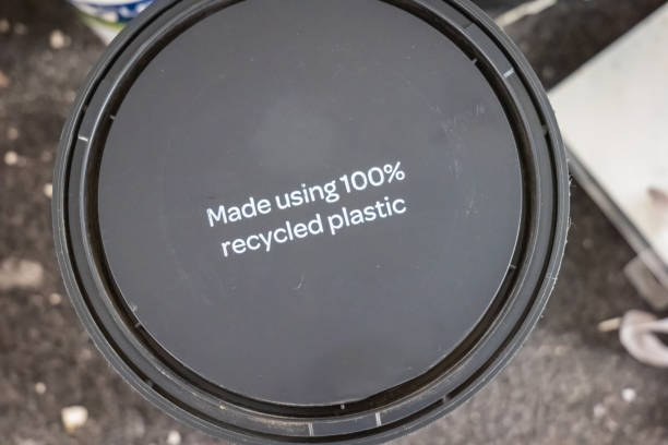 istock Overhead view plastic paint can over dirty background 2114361373