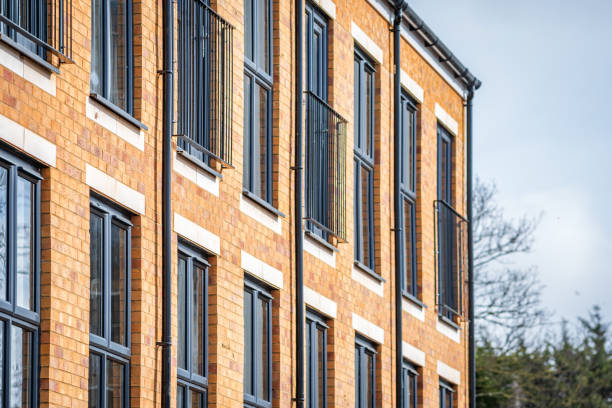 istock Construction aparments building site in england uk. 2114361386