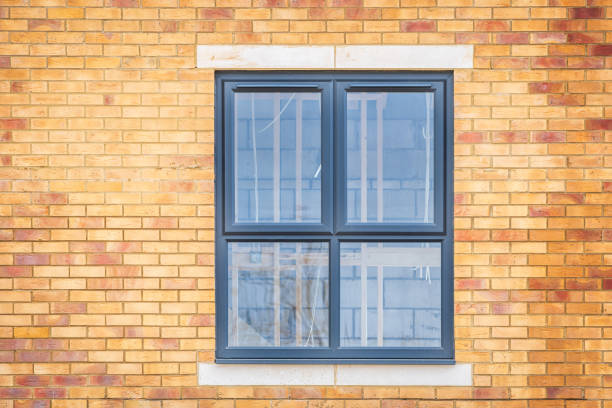 istock Window view of construction aparments building site in england uk. 2114361388