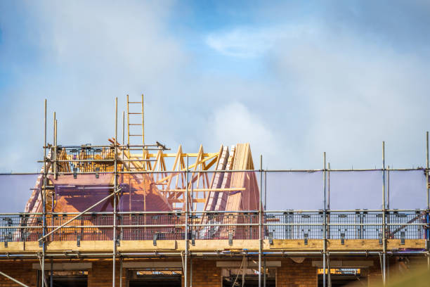 istock Construction aparments building site in england uk. 2114361392