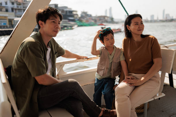 istock Family riding a ferry together 2114372918