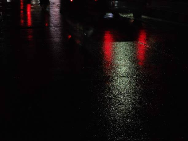 Reflection of vehicle light on wet roads