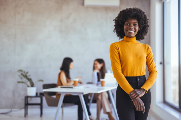 istock Beautiful young grinning professional Black woman in office 2114419632