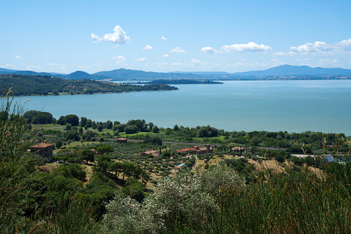 The Trasimeno lake at summer near Passignano, in Perugia province, Umbria, Italy