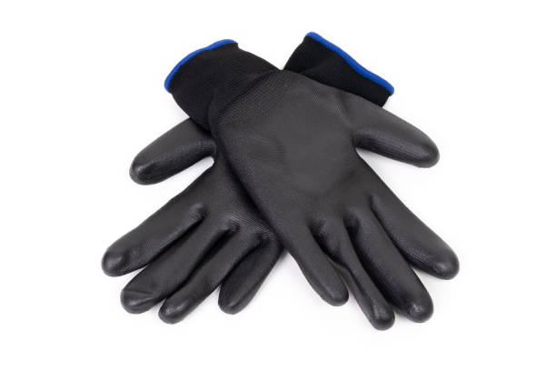 istock Black PU Work Gloves Crossed on White 2114445502