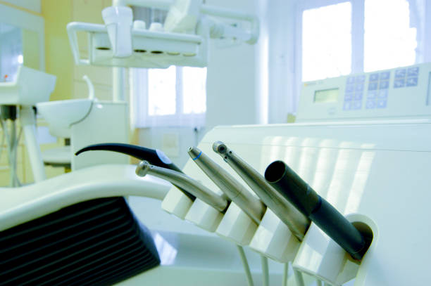 Female Dentist And Her Team Waiting For Patients
