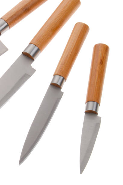 Full kitchen knife set on white background stock photo