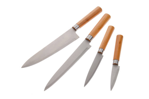 Full kitchen knife set on white background stock photo