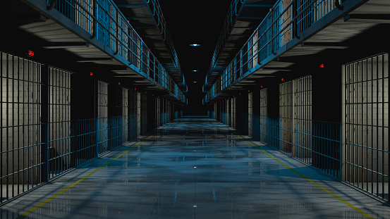 Inside prison corridor at night.  cells with lights on and wet floor. 3d rendering.