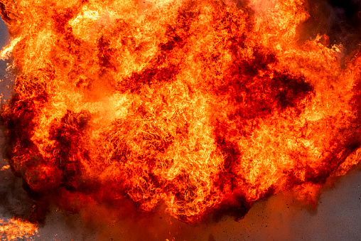 Explosion of explosives, large fire.